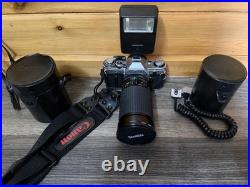 Vintage Canon AE-1 35mm SLR Film Camera with 35-200mm and 100mm FD Lens
