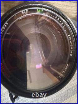 Vintage Canon AE-1 35mm SLR Film Camera with 35-200mm and 100mm FD Lens