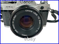 Vintage Canon AE-1 35mm SLR Film Camera with 50mm f/1.8 Lens Tested