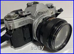 Vintage Canon AE-1 35mm SLR Film Camera with Canon 50 mm 11.4 Lens