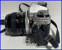 Vintage Canon AE-1 35mm SLR Film Camera with Canon 50 mm 11.4 Lens