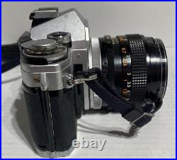 Vintage Canon AE-1 35mm SLR Film Camera with Canon 50 mm 11.4 Lens
