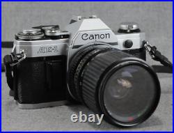 Vintage Canon AE-1 35mm SLR Film Camera with2 Lenses, Case, New Battery