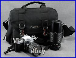 Vintage Canon AE-1 35mm SLR Film Camera with2 Lenses, Case, New Battery