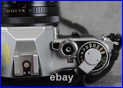 Vintage Canon AE-1 35mm SLR Film Camera with2 Lenses, Case, New Battery