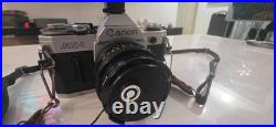Vintage Canon AE-1 35mm SLR Film Camera withROKUNAR 52MM LENS