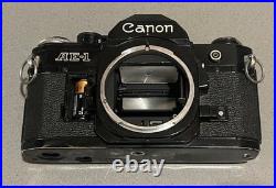 Vintage Canon AE-1 35mm SLR Manual Focus Camera All Black + RMC Tokina Lens