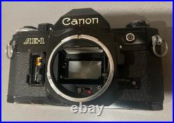 Vintage Canon AE-1 35mm SLR Manual Focus Camera All Black + RMC Tokina Lens