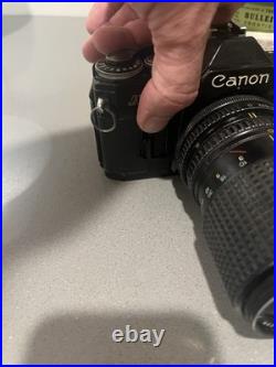 Vintage Canon AE-1 35mm SLR Manual Focus Camera All Black + RMC Tokina Lens