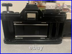 Vintage Canon AE-1 35mm SLR Manual Focus Camera All Black + RMC Tokina Lens