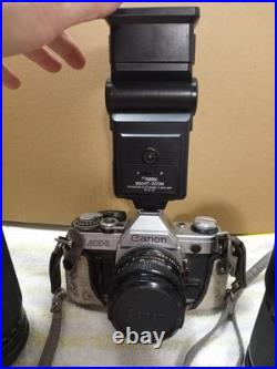 Vintage Canon AE-1 Camera Lot With 3 Lenses Flashes Manuals & Carry Bag