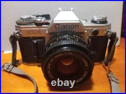 Vintage Canon AE-1 Camera Lot With 3 Lenses Flashes Manuals & Carry Bag