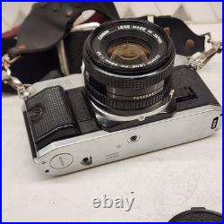 Vintage Canon AE-1 Program 35 mm SLR Camera With Canon 50mm 11.8 Lens