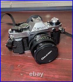 Vintage Canon AE 1 Program 35mm Camera with 11.8 50mm Lens Sold As Is Untested