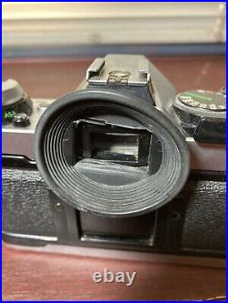 Vintage Canon AE 1 Program 35mm Camera with 11.8 50mm Lens Sold As Is Untested