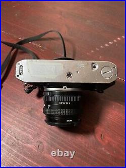 Vintage Canon AE 1 Program 35mm Camera with 11.8 50mm Lens Sold As Is Untested