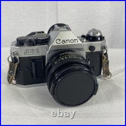 Vintage Canon AE-1 Program 35mm Camera with Neck Strap, Case, and Lens Cover