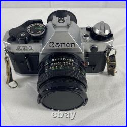 Vintage Canon AE-1 Program 35mm Camera with Neck Strap, Case, and Lens Cover