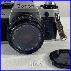 Vintage Canon AE-1 Program 35mm Camera with Neck Strap, Case, and Lens Cover