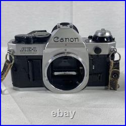 Vintage Canon AE-1 Program 35mm Camera with Neck Strap, Case, and Lens Cover