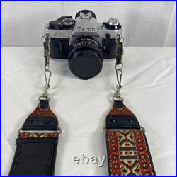 Vintage Canon AE-1 Program 35mm Camera with Neck Strap, Case, and Lens Cover