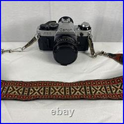 Vintage Canon AE-1 Program 35mm Camera with Neck Strap, Case, and Lens Cover