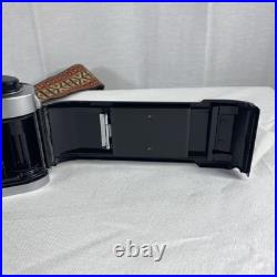 Vintage Canon AE-1 Program 35mm Camera with Neck Strap, Case, and Lens Cover