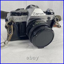 Vintage Canon AE-1 Program 35mm Camera with Neck Strap, Case, and Lens Cover