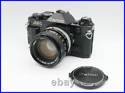 Vintage Canon AE-1 Program 35mm SLR Camera with 50mm 11.8 Lens