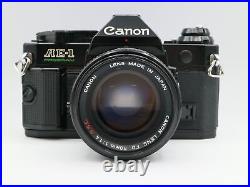 Vintage Canon AE-1 Program 35mm SLR Camera with 50mm 11.8 Lens
