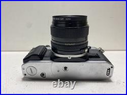 Vintage Canon AE-1 Program 35mm SLR Camera with 50mm f/1.4 FD Lens Tested