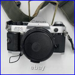 Vintage Canon AE-1 Program 35mm SLR Camera with2 Lens 2 Flashes Manual Extras