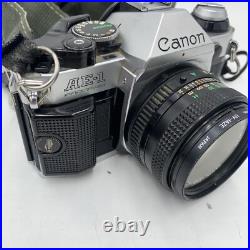 Vintage Canon AE-1 Program 35mm SLR Camera with2 Lens 2 Flashes Manual Extras
