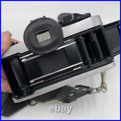 Vintage Canon AE-1 Program 35mm SLR Camera with2 Lens 2 Flashes Manual Extras