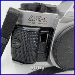 Vintage Canon AE-1 Program 35mm SLR Camera with2 Lens Flash Extras Film Docs Extra