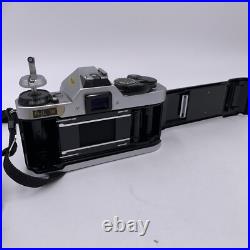 Vintage Canon AE-1 Program 35mm SLR Camera with2 Lens Flash Extras Film Docs Extra
