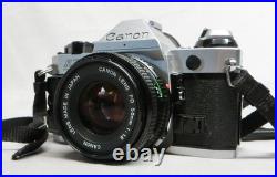 Vintage Canon AE-1 Program 35mm SLR Film Camera with50mm f1.8 Lens & Manual VGC Vintage Canon AE-1 Program 35mm SLR Film Camera with50mm f1.8 Lens & Manual VGC
