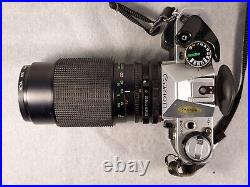 Vintage Canon AE-1 Program 35mm SLR Film Camera with75-205mm Zoom Lens Tested