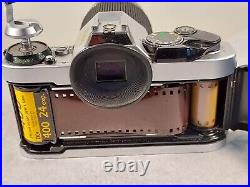 Vintage Canon AE-1 Program 35mm SLR Film Camera with75-205mm Zoom Lens Tested