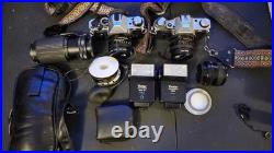 Vintage Canon AE-1 Program & AE-1 35mm SLR Film Camera Bundle 4 Lens 2 Flash Bag