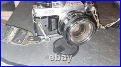 Vintage Canon AE-1 Program & AE-1 35mm SLR Film Camera Bundle 4 Lens 2 Flash Bag