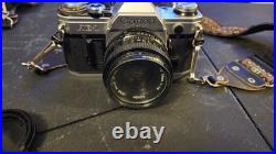 Vintage Canon AE-1 Program & AE-1 35mm SLR Film Camera Bundle 4 Lens 2 Flash Bag