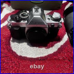 Vintage Canon AE-1 Program Camera With Lens And Carrying Cases