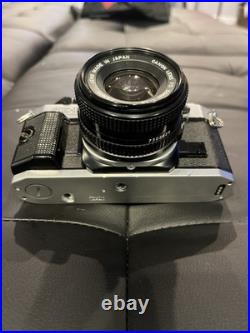 Vintage Canon AE-1 Program Camera With Lenses Manual Carrying Case Untested