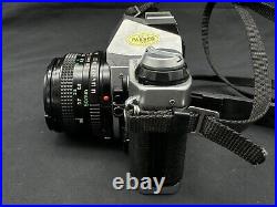 Vintage Canon AE-1 Program SLR Camera with FD 50mm 11.8 Lens