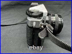 Vintage Canon AE-1 Program SLR Camera with FD 50mm 11.8 Lens