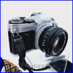 Vintage Canon AE-1 SLR 35mm Film Camera with Canon 50mm Lens & New Battery Tested