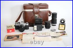 Vintage Canon AE-1 SLR Camera Kit Silver Black with Lenses Flash Accessories