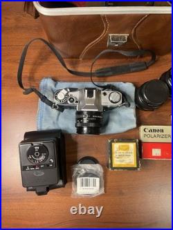Vintage Canon AE-1 SLR Camera Kit Silver Black with Lenses Flash Accessories
