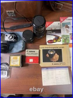 Vintage Canon AE-1 SLR Camera Kit Silver Black with Lenses Flash Accessories